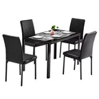 Tavolo da pranzo rettangolare a 4 posti in vetro temperato e tubi di ferro neri (sedie escluse)