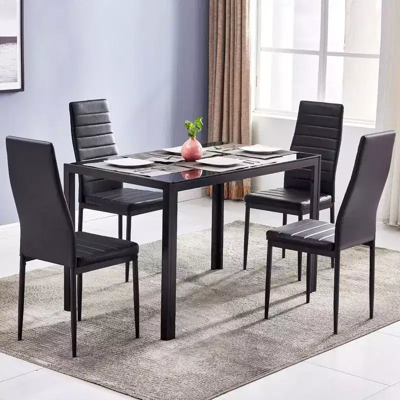 Tavolo da pranzo rettangolare a 4 posti in vetro temperato e tubi di ferro neri (sedie escluse)