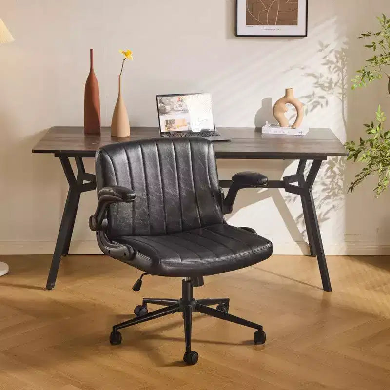 Karl Home | Poltrona girevole in pelle oleata con braccioli ribaltabili