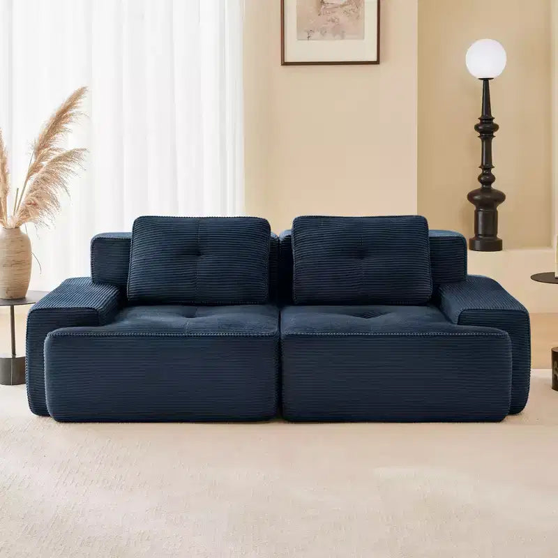 Divano componibile moderno Okak con design trapuntato e cuscini, divano a seduta profonda per soggiorno, appartamento, camera degli ospiti