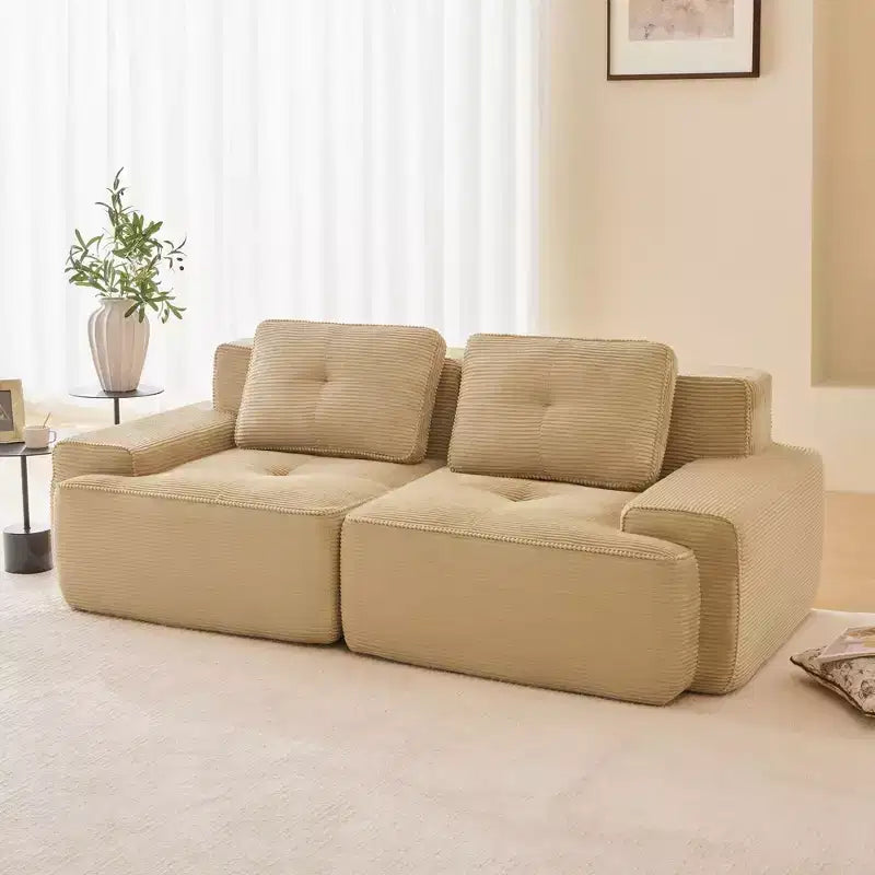 Divano componibile moderno Okak con design trapuntato e cuscini, divano a seduta profonda per soggiorno, appartamento, camera degli ospiti