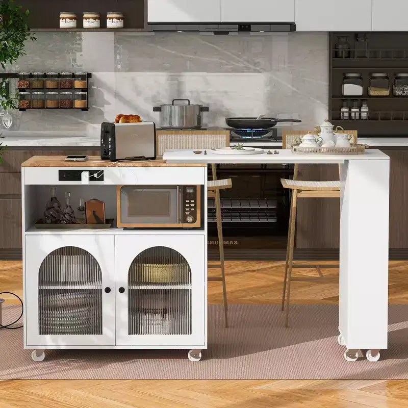Isola Cucina con Ruote Okak, 2 Ante in Vetro, Carrello Cucina con Tavolo Estensibile e Prese Elettriche, Isola Cucina con Scaffali Laterali Aperti
