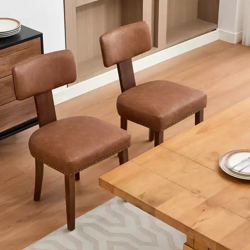 Due sedie da pranzo in set, moderne, rivestite in pelle, struttura in legno, capacità di carico 120 kg, facili da pulire, schienale curvo.