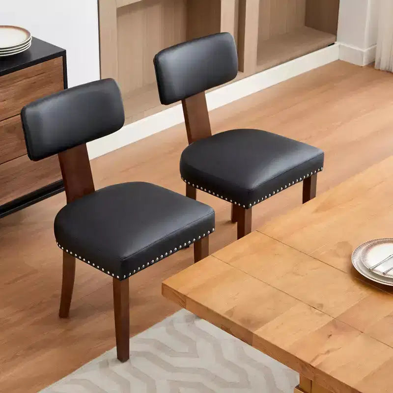 Due sedie da pranzo in set, moderne, rivestite in pelle, struttura in legno, capacità di carico 120 kg, facili da pulire, schienale curvo.