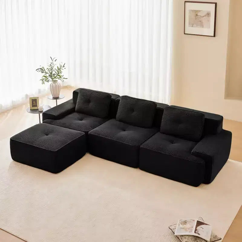 Divano componibile moderno a L 117 per soggiorno, in tessuto a coste, divano a 3 posti con seduta profonda e pouf mobile, color cammello