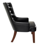Sedia da pranzo LeisureMod rivestita in velluto e pelle con schienale alto capitonné e gambe in legno di caucciù verniciato