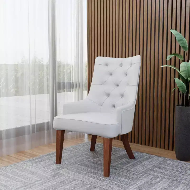 Sedia da pranzo LeisureMod rivestita in velluto e pelle con schienale alto capitonné e gambe in legno di caucciù verniciato